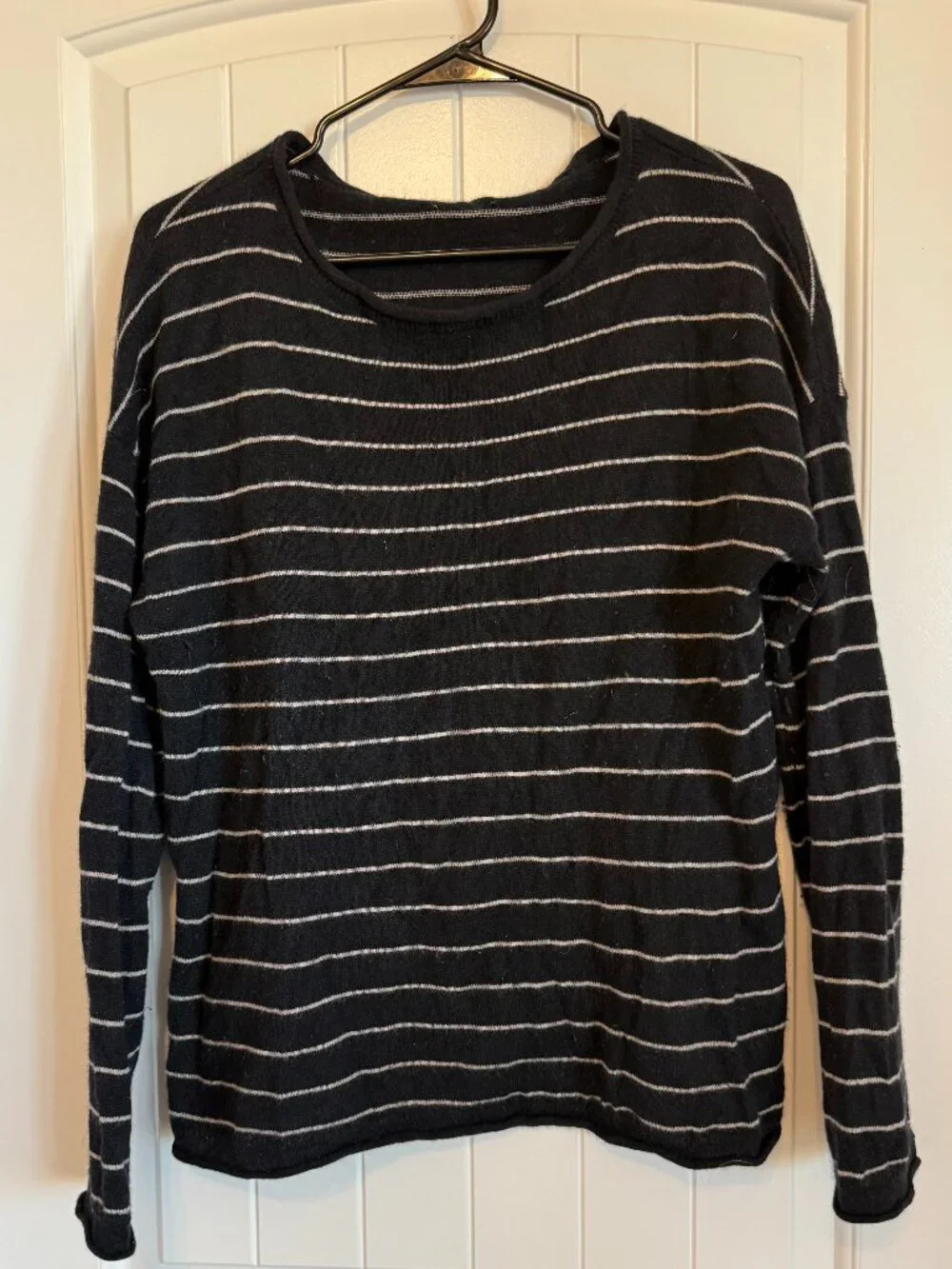 Black and white striped long sleeve knit sweater